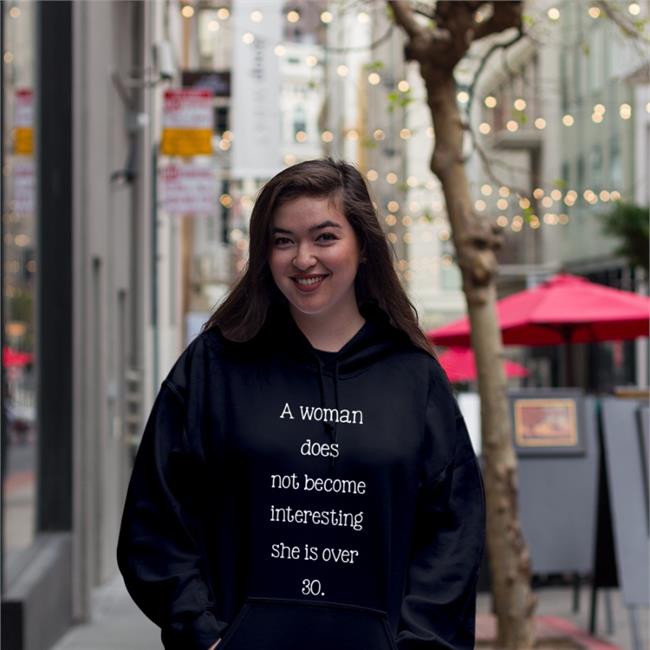 A Woman Does Not Become Interesting Until She Is Over 30 T Shirt